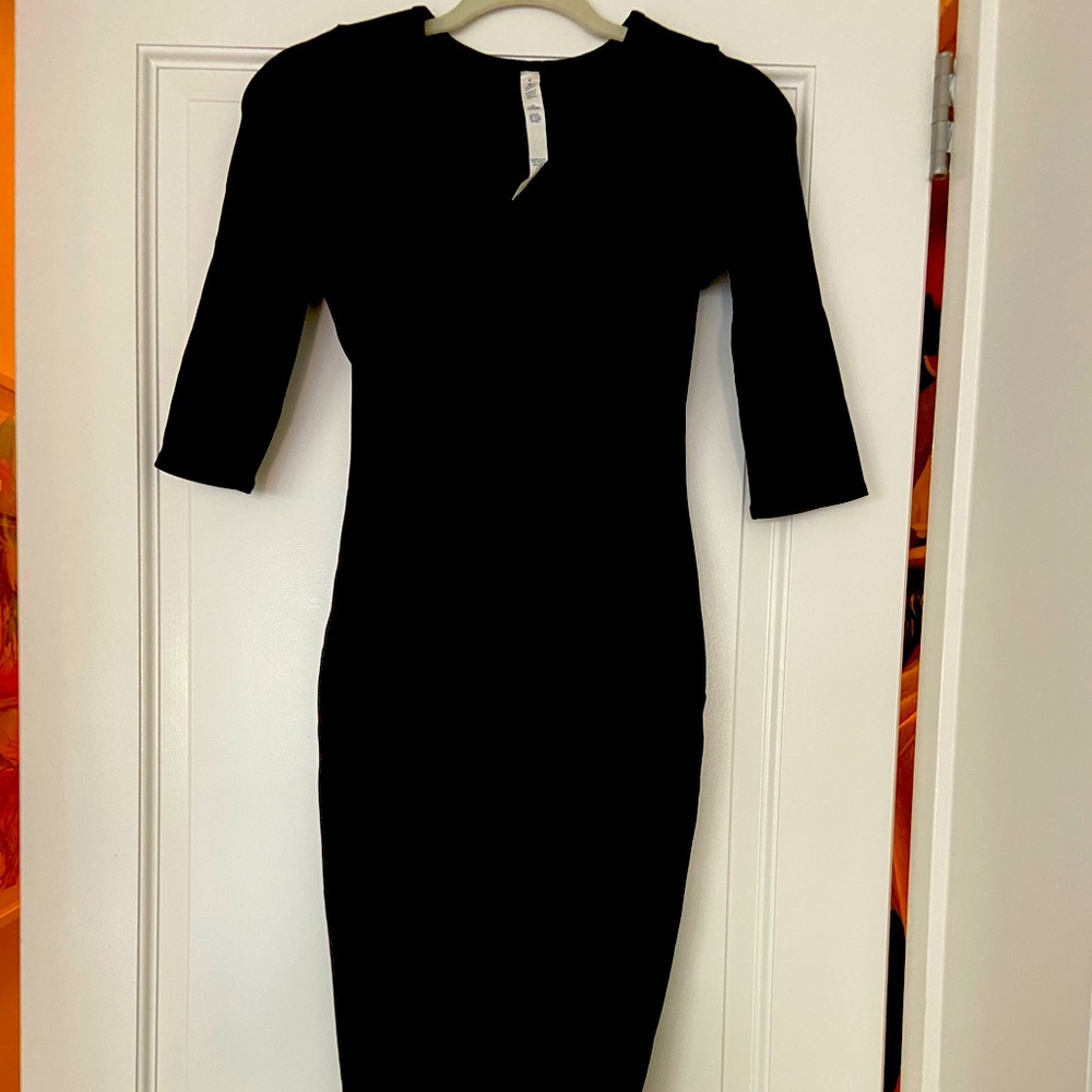 Lululemon knee-length stretchy black dress